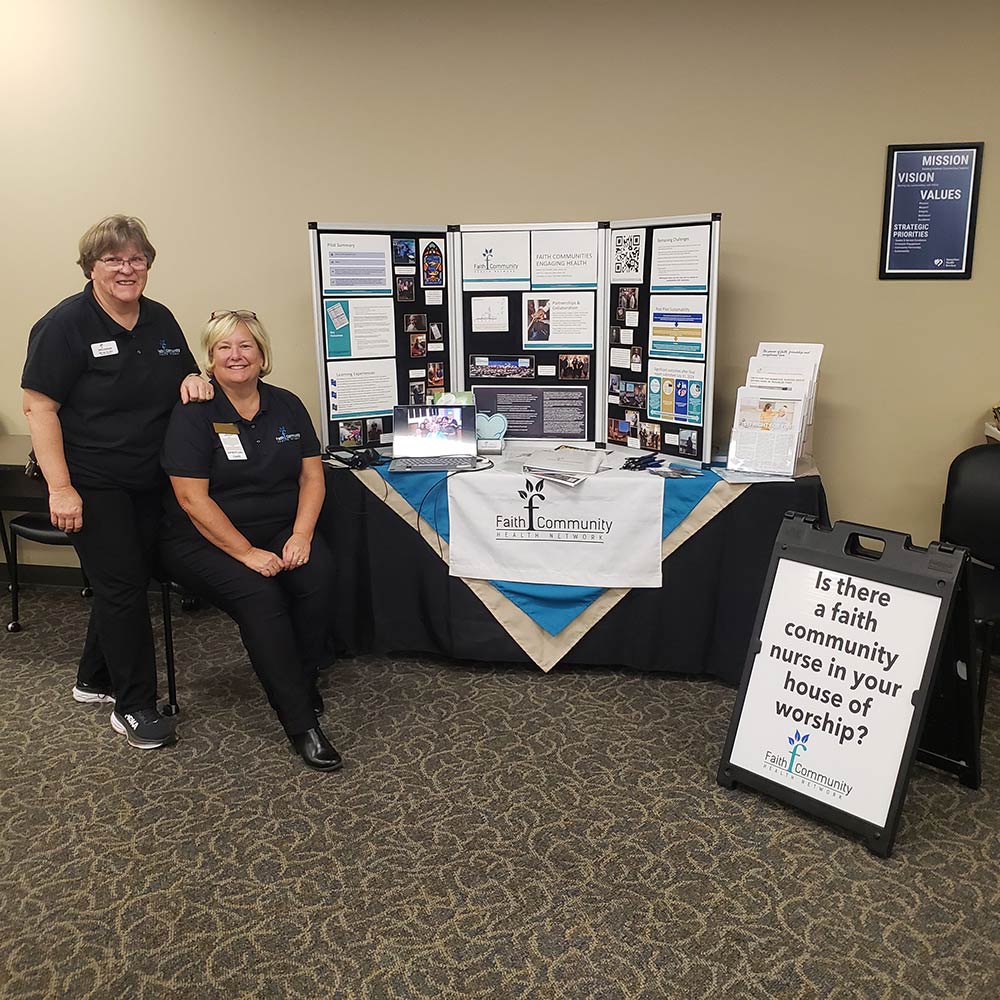 Marcy and Deb at DST Symposium