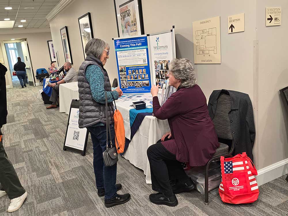 Susan Freeman, Health Minister, engages with an attendee at the 2026 OSU Gerontology Conference